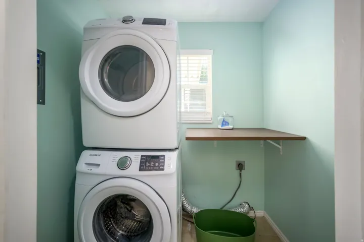 Stacked white laundry appliances