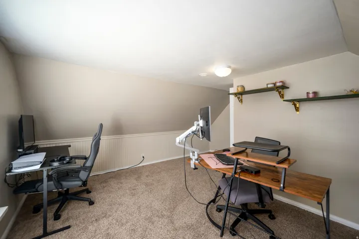 Sloping ceiling with recessed lighting