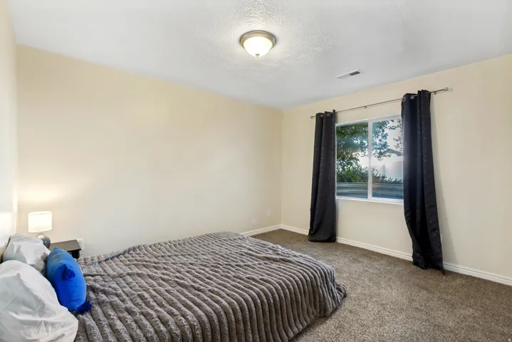 Bedroom in basement apartment. Gets great natural light!