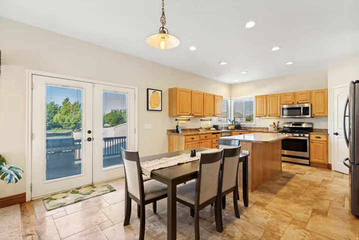 Open kitchen with stainless steel appliances, a center island - appliances included!
