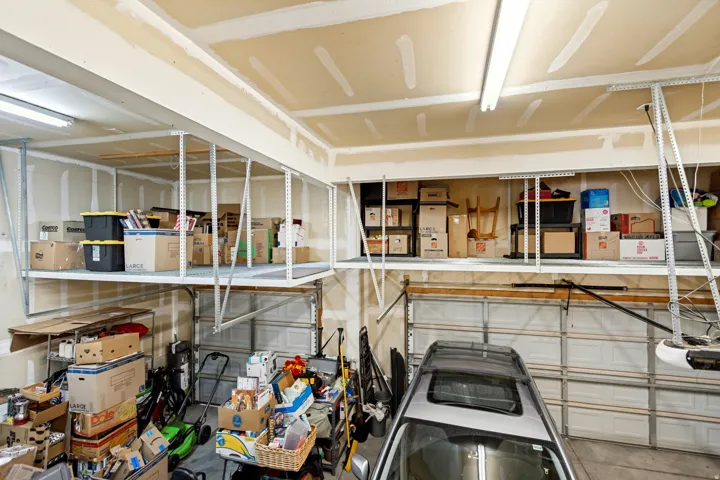 BIG 3 car garage with lots of storage above!