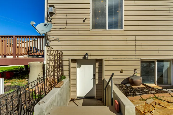 Separate entry with a security light to basement apartment.