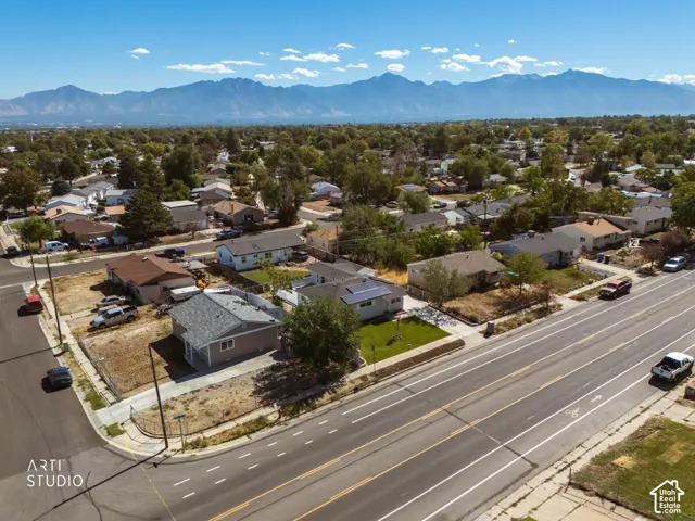 Residential neighborhood with prominent mountain backdrop