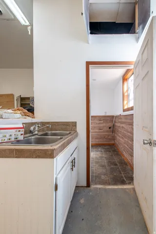 Dual-basin stainless steel sink with tile countertop