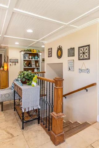 White coffered ceiling with recessed lighting