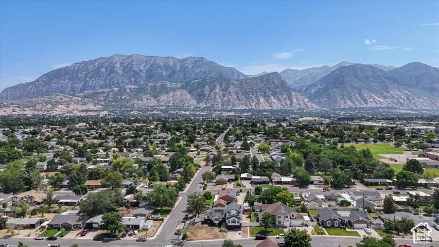 Expansive suburban landscape with a prominent mountain backdrop