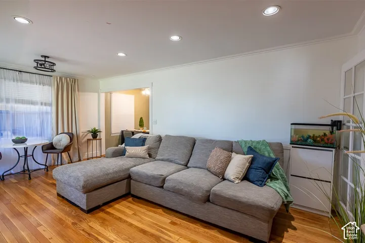 Spacious living room offers a welcoming space upon entering.
