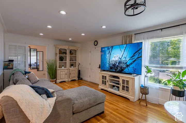 Recessed lighting and large windows offer plenty of light to this space.