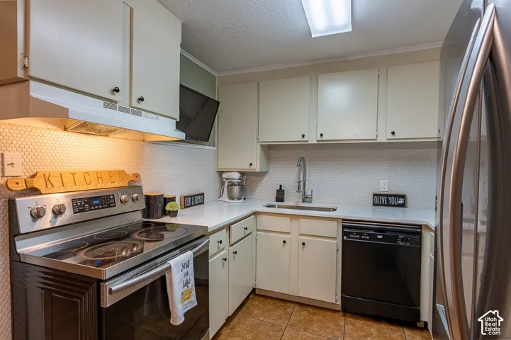 Quartz countertops throughout give a modern touch to this kitchen.
