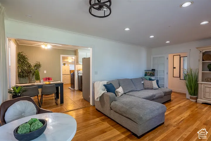 Cozy dining space connects the kitchen and living area, perfect for family dining or entertaining guests.