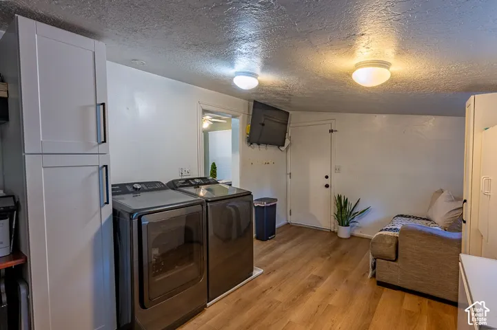 Laundry room, storage, and tv corner.
