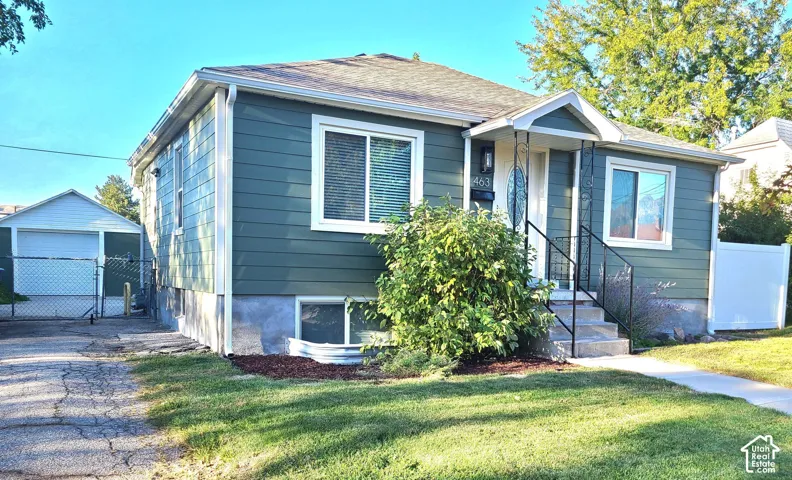Fresh curb appeal welcomes you home with mature landscaping, new Hardie board siding, new windows, and a new roof. The detached extra-wide one-car garage provides additional space for storage, hobbies, or a workbench.