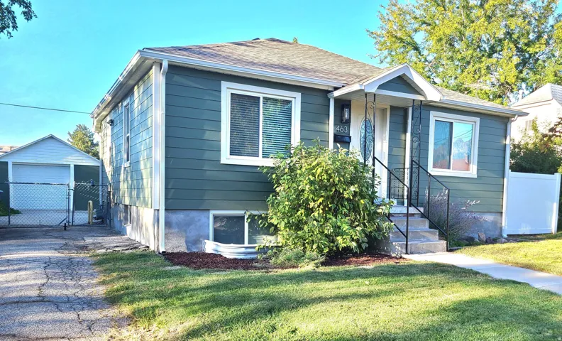 Fresh curb appeal welcomes you home with mature landscaping, new Hardie board siding, new windows, and a new roof. The detached extra-wide one-car garage provides additional space for storage, hobbies, or a workbench.