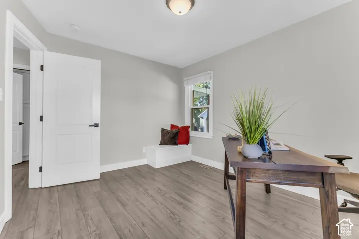 Whether you're working from home, welcoming overnight guests, or need a third bedroom, this versatile space adapts to your needs. The custom built-in bench adds character while creating comfortable headroom for the staircase below.