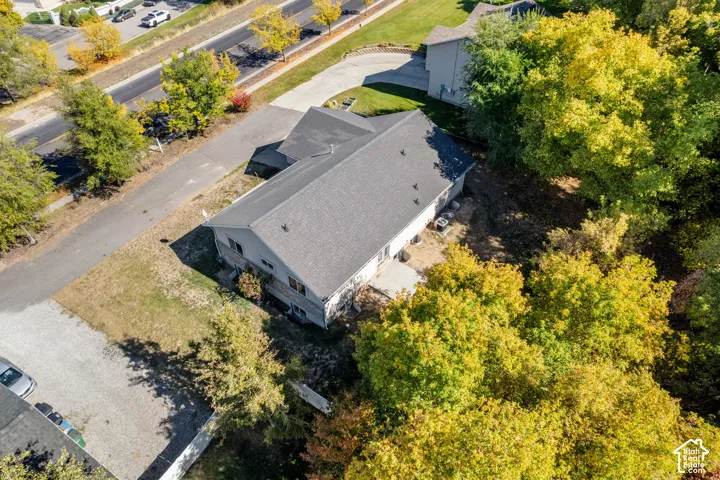 Single-story residence with a gray asphalt shingle roof