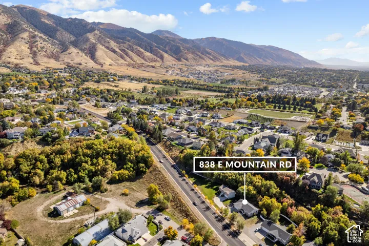 Mountainous backdrop with residential development