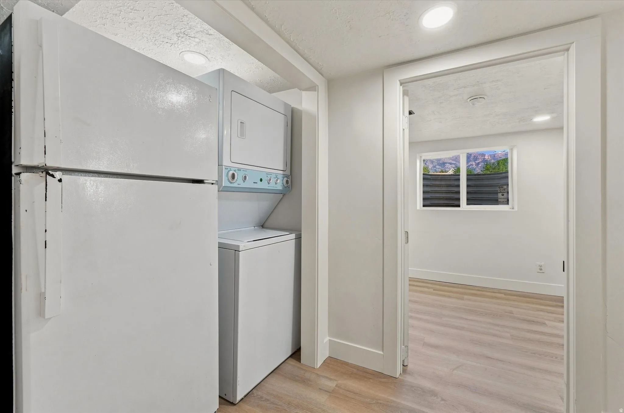Compact laundry area with stackable washer and dryer
