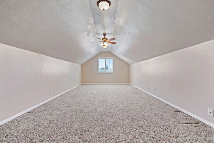 240 SF Bonus room above the garage. Great for watching a movie, a toy room, an office, or for those little gamers.