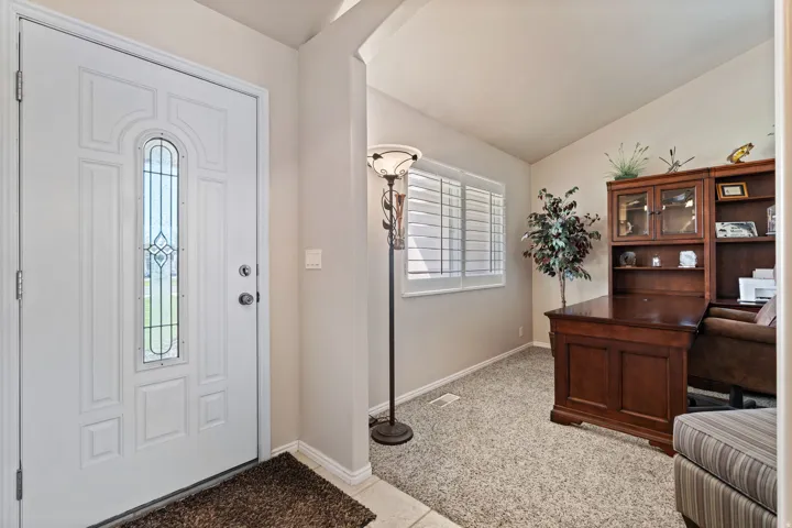 Entry. Formal living room or office.