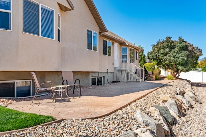 Backyard: Large patio. Room for your gazebo, your hot tub, and your outdoor furniture. Low maintenance. 90% zero scaped.