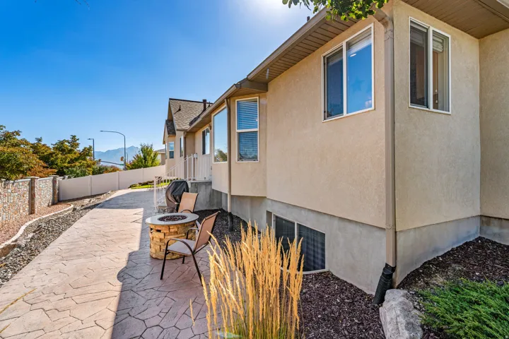 Backyard: Large patio. Room for your gazebo, your hot tub, and your outdoor furniture. Low maintenance. 90% zero scaped.