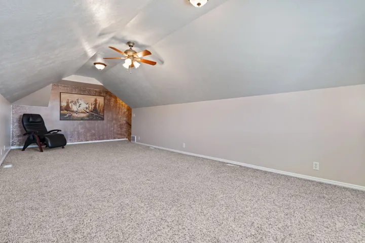 240 SF Bonus room above the garage. Great for watching a movie, a toy room, an office, or for those little gamers.