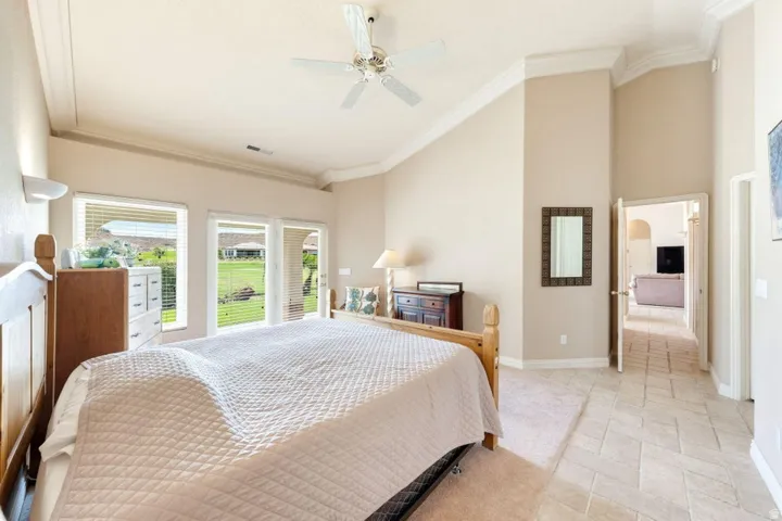 Vaulted ceilings featuring a ceiling fan, recessed lighting, and crown molding
