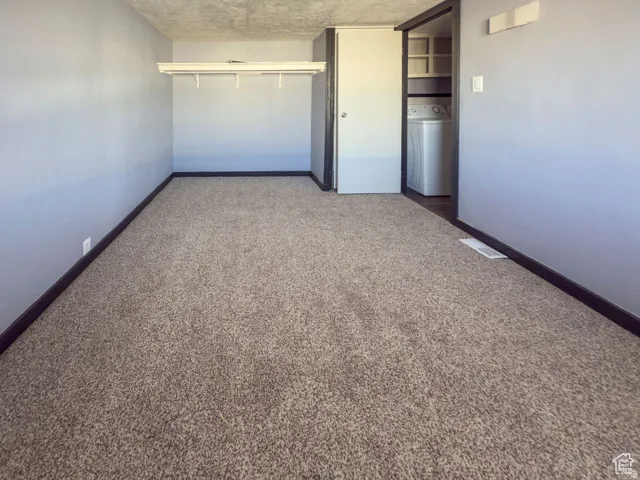 Plush carpeting with a built-in closet rod and shelving