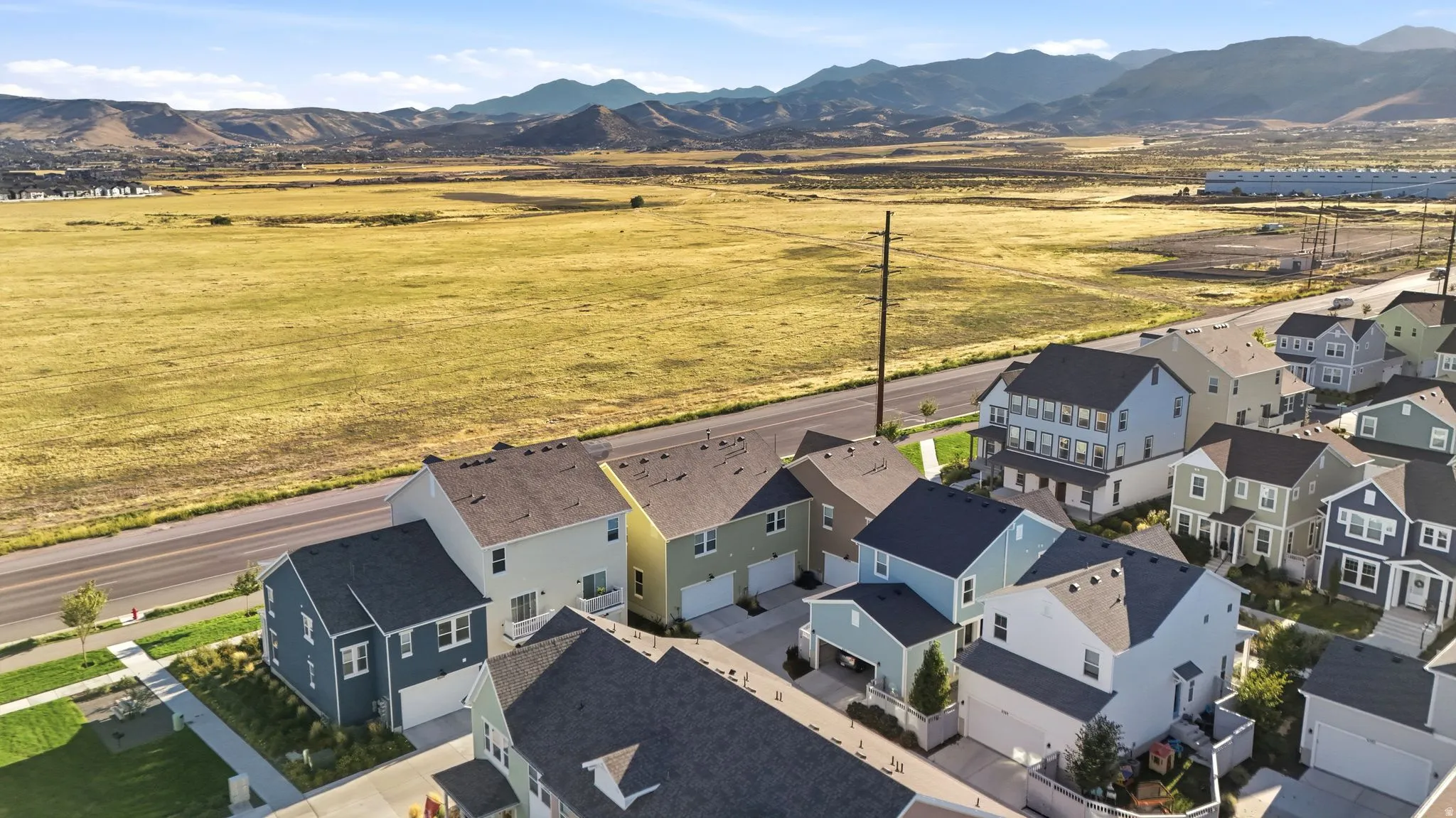 Residential development featuring multiple properties with varied exterior finishes