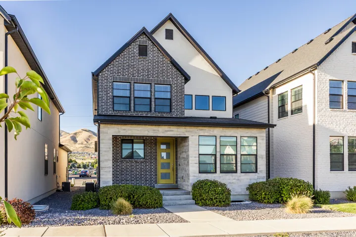 Modern two-story residence with a prominent gabled roofline