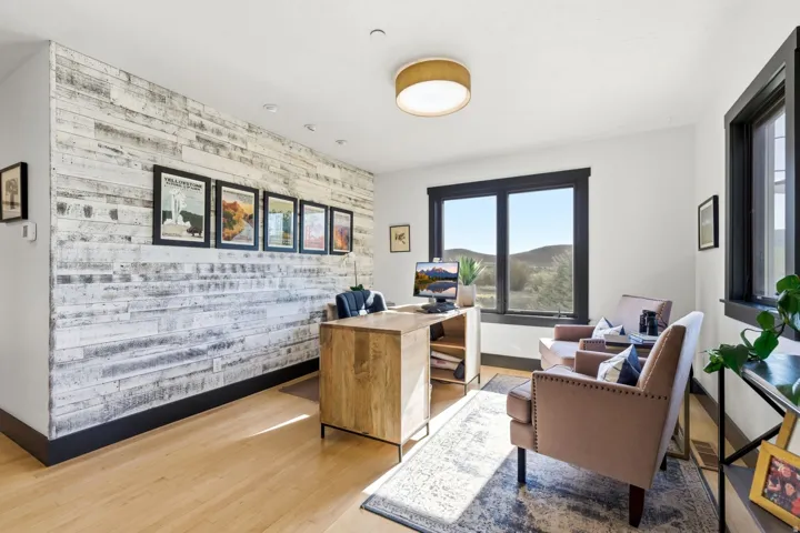 Wood-finish flooring with a distressed wood accent wall
