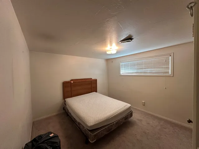 Recessed window featuring horizontal blinds