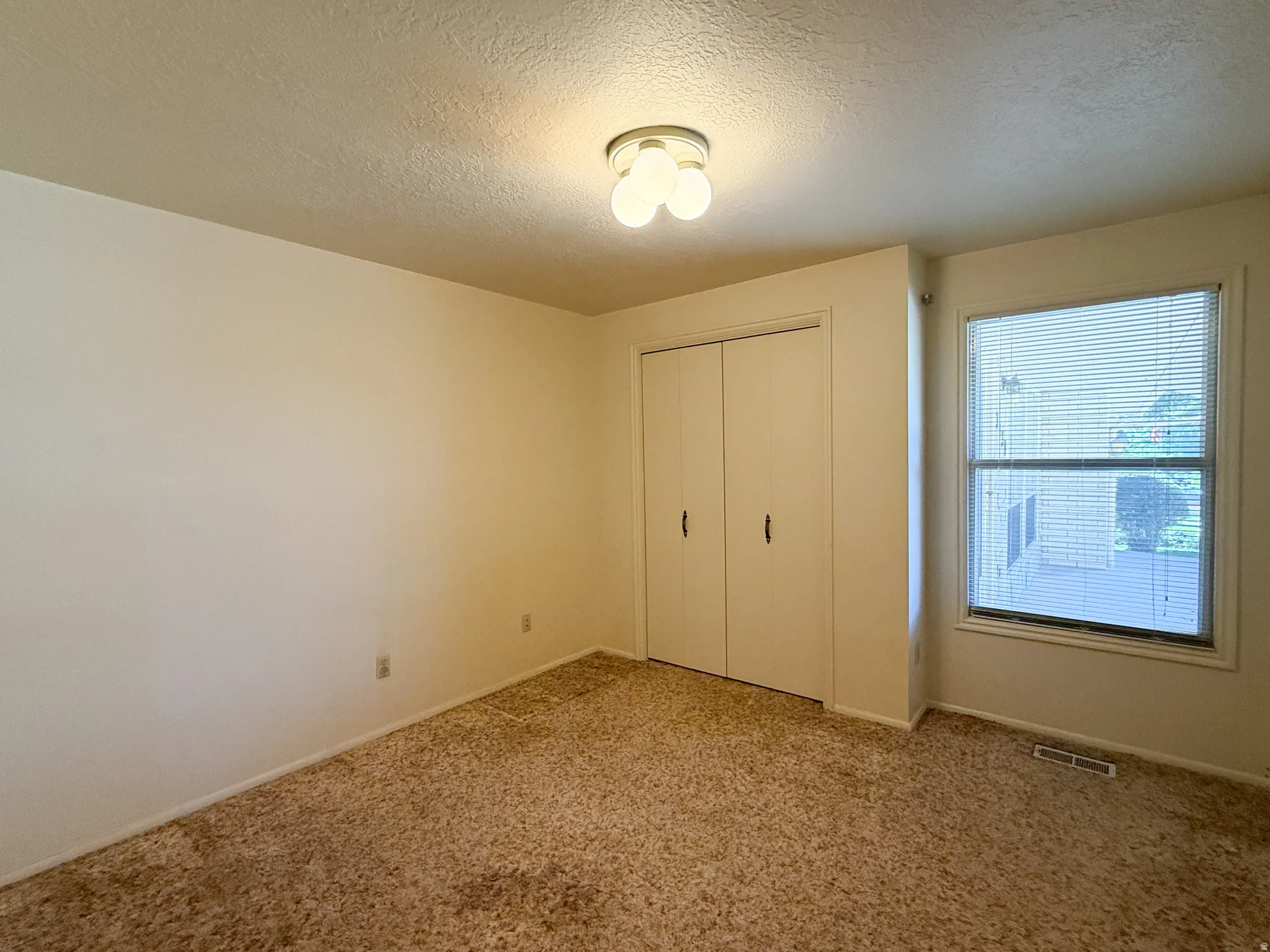 #3 Bedroom with Closet Doors on Main Floor