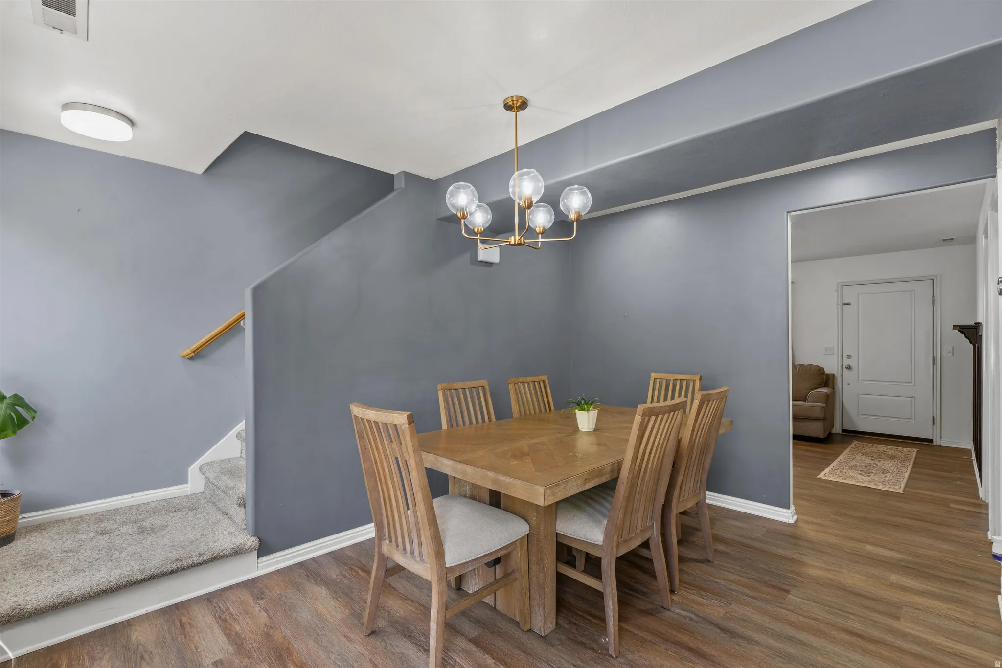 Wood-finish flooring throughout the dining area