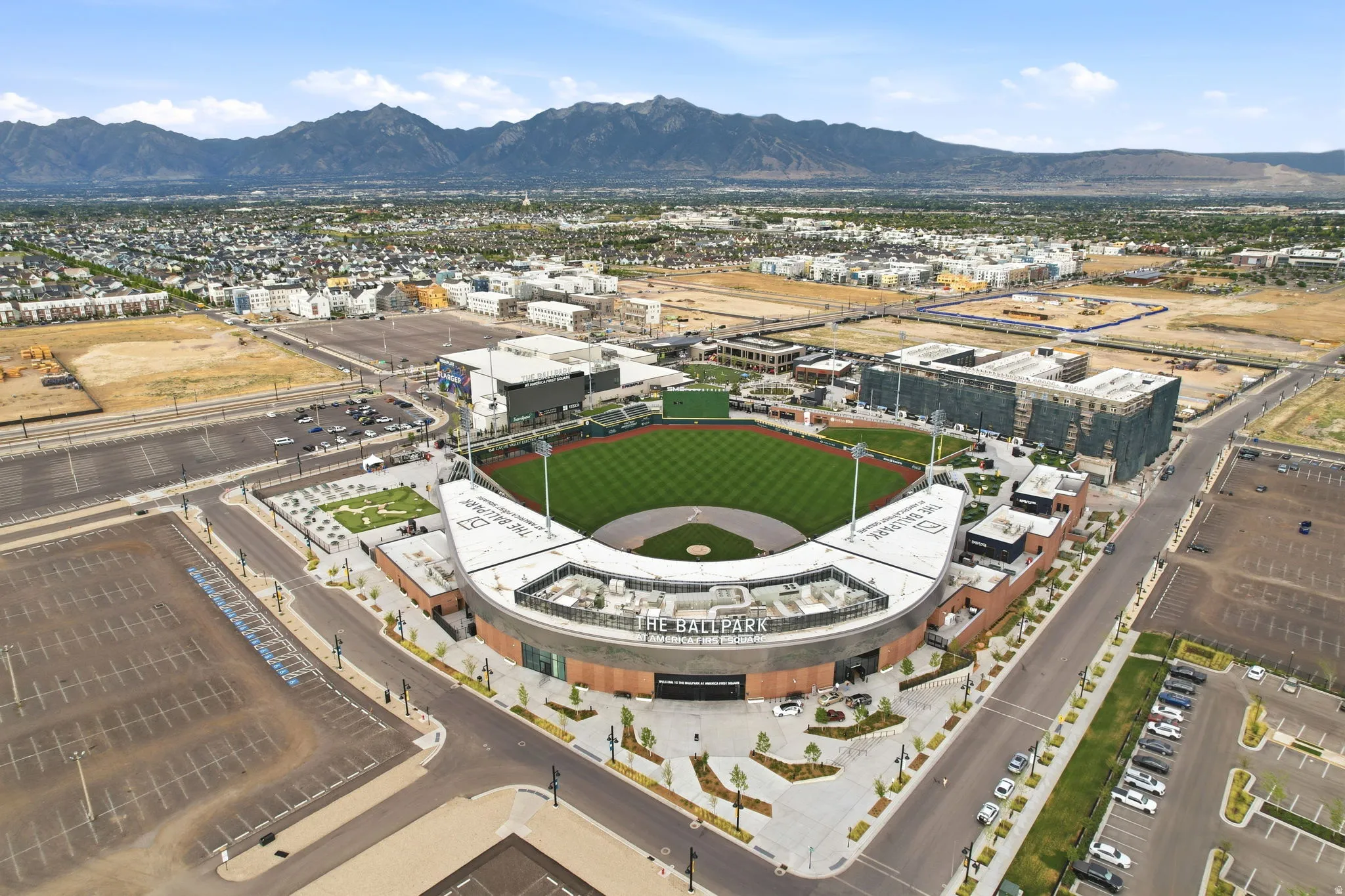 Aerial perspective showcasing the ballpark and surrounding urban development