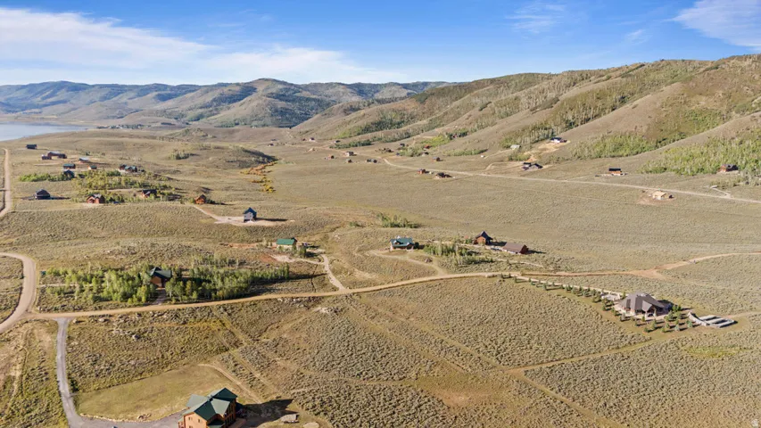 Expansive acreage with scattered residential structures