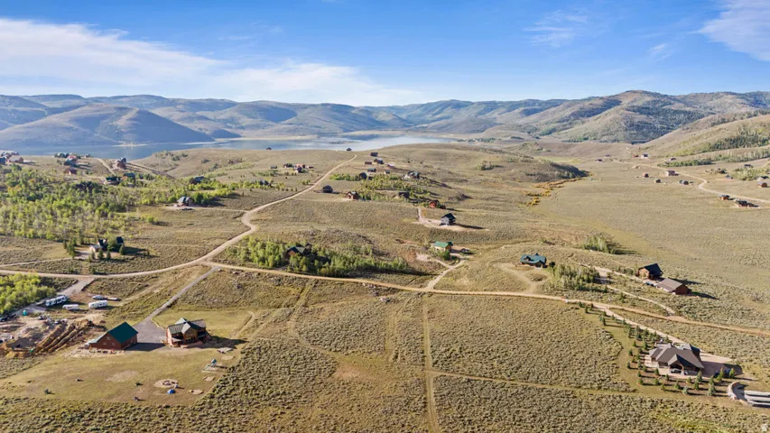 Expansive land parcels with scattered residential structures