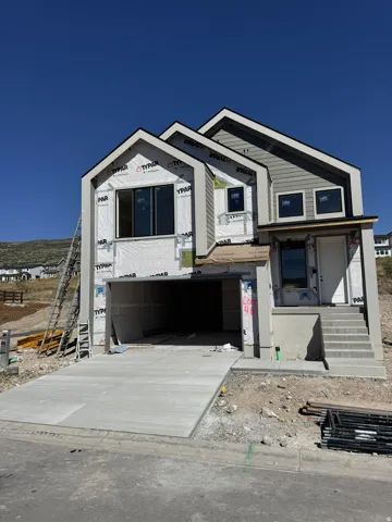 Contemporary architectural design with multiple gables and horizontal siding