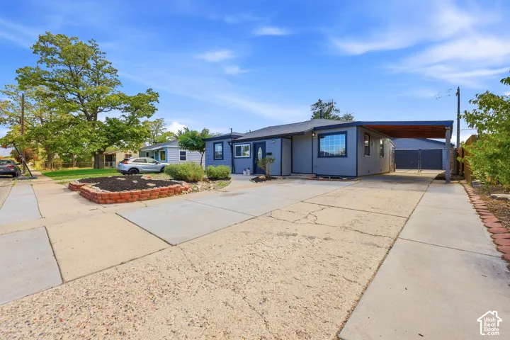 Gray exterior with dark trim and windows