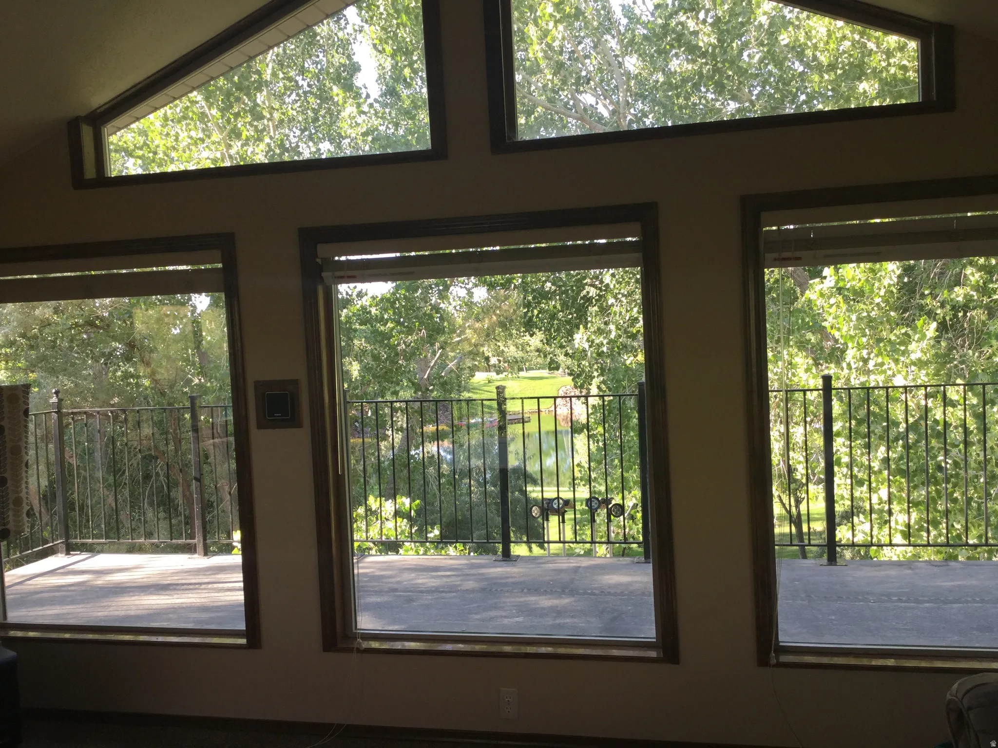 Expansive windows with transom accents, providing abundant natural light