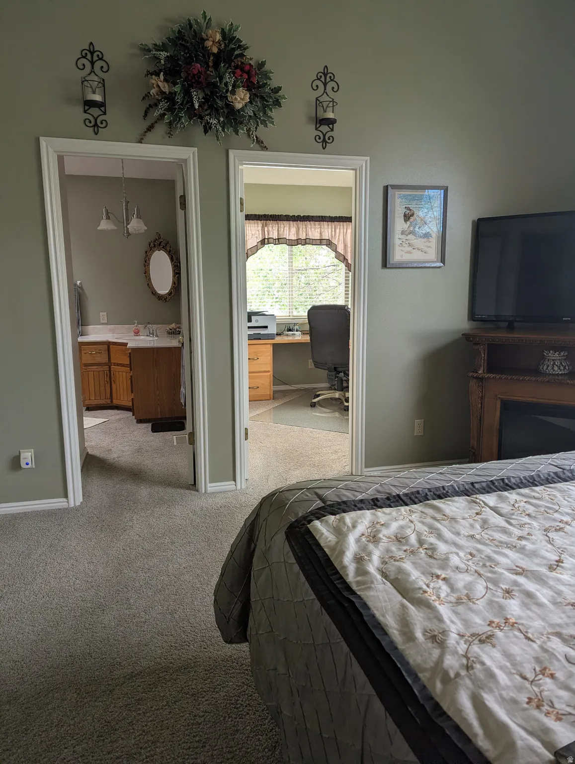 Carpeted flooring extending into two separate doorways