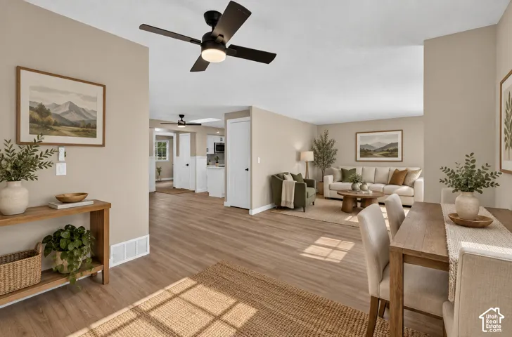 Wood-finish flooring throughout, complemented by neutral wall tones