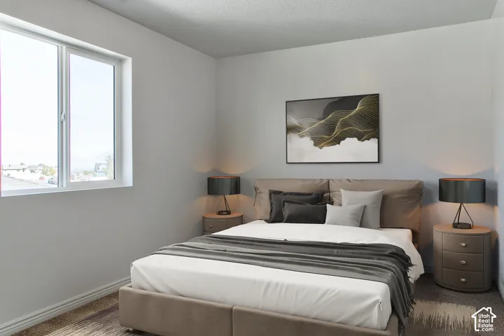 White-painted walls and a textured ceiling