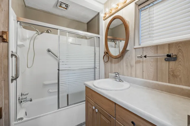 Primary bathroom with tub/shower combo