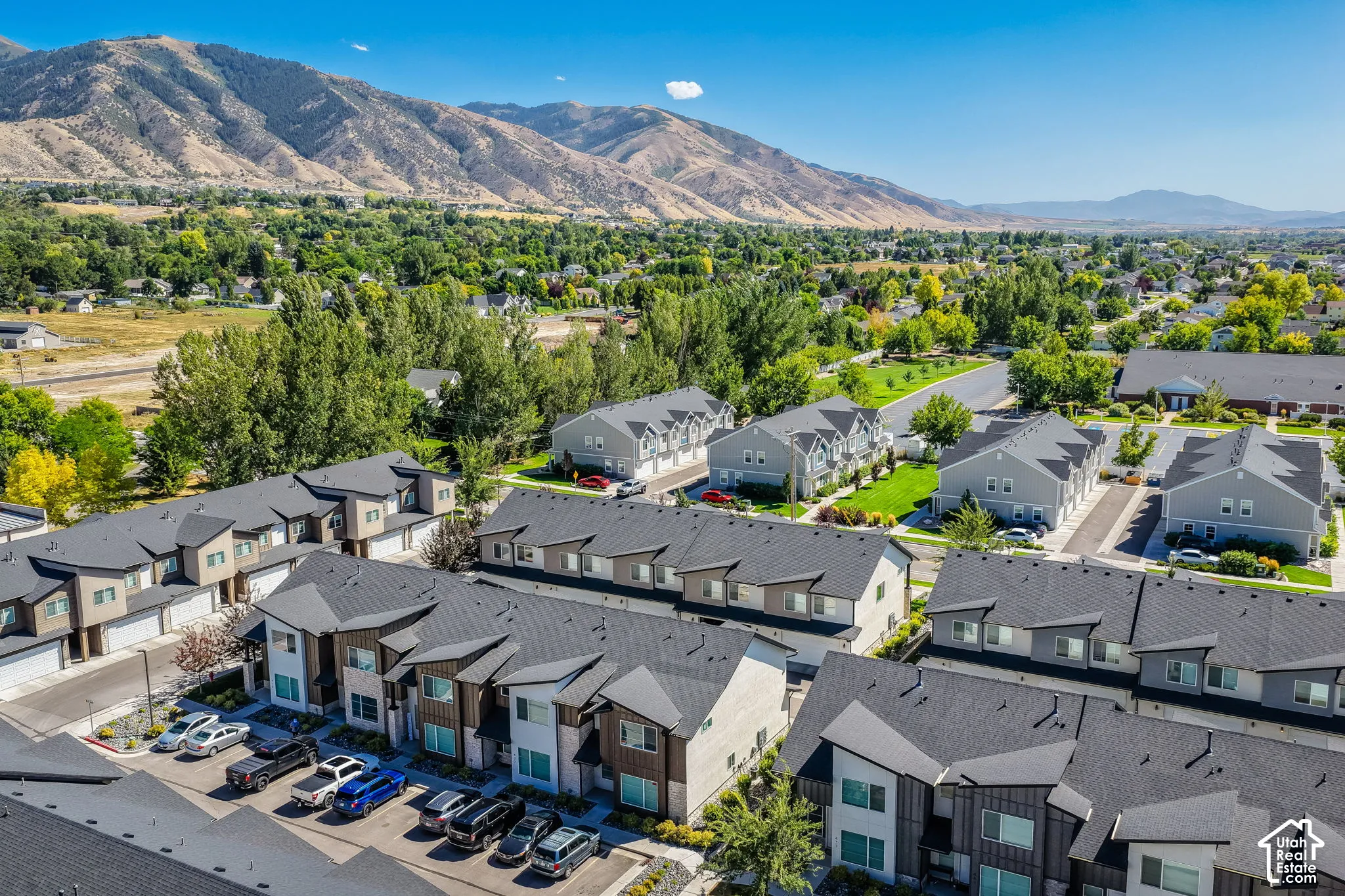 Modern townhomes with multi-tone facades and attached garages