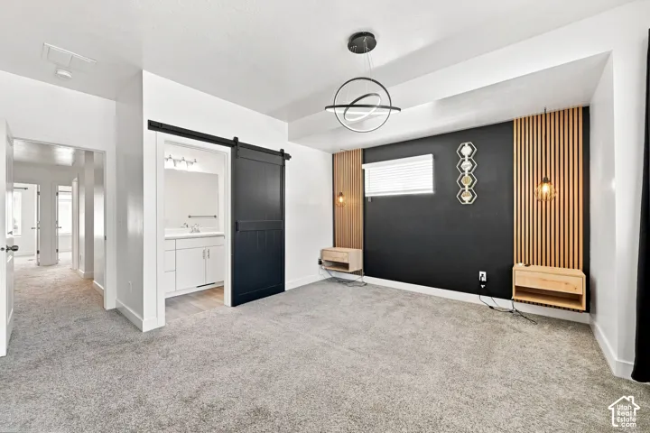 Accent wall with vertical wood paneling and integrated lighting