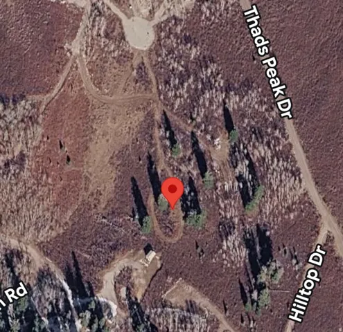 Aerial Map. Illustrating the property's location and surrounding topographical features with identified roadways