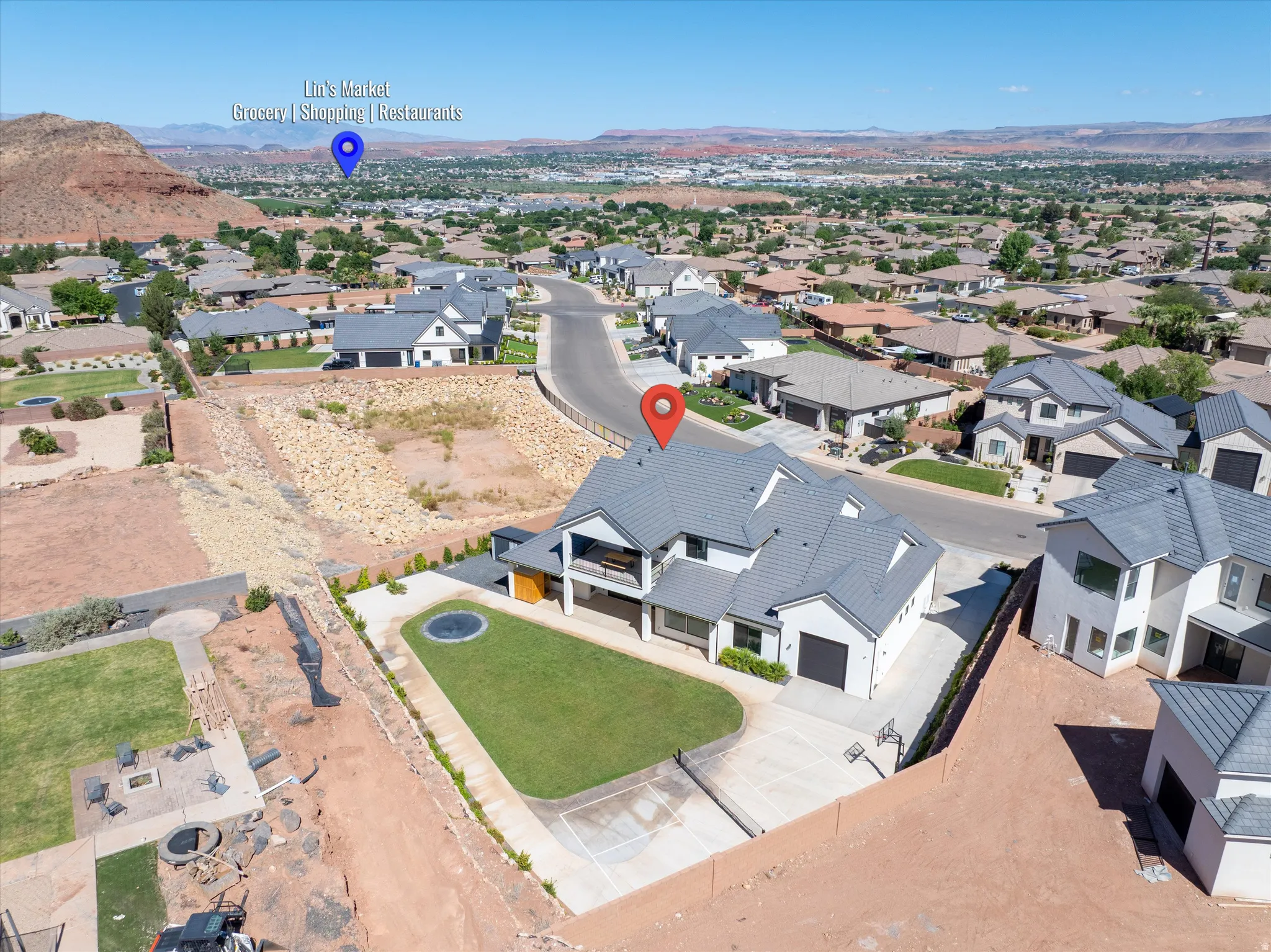 Modern-style architecture with a multi-level design and a dark gray tile roof