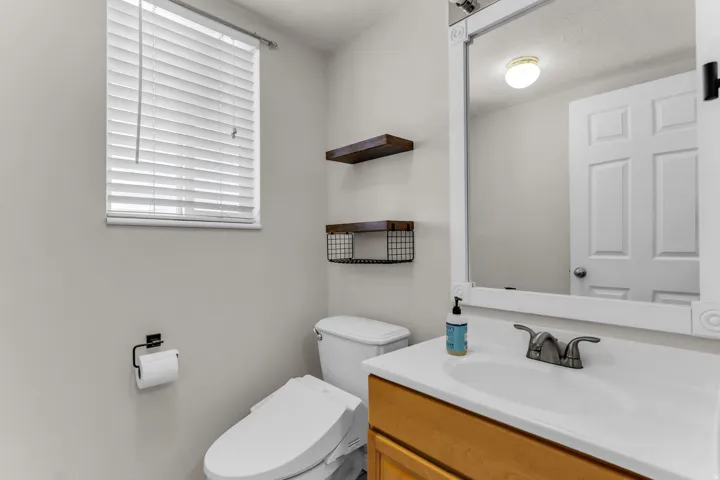 Contemporary vanity with an integrated sink and chrome faucet