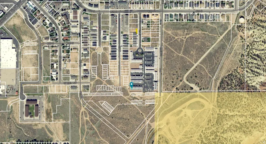 Aerial Survey Map. Depicting the property layout, infrastructure, parcel boundaries, and surrounding land use patterns